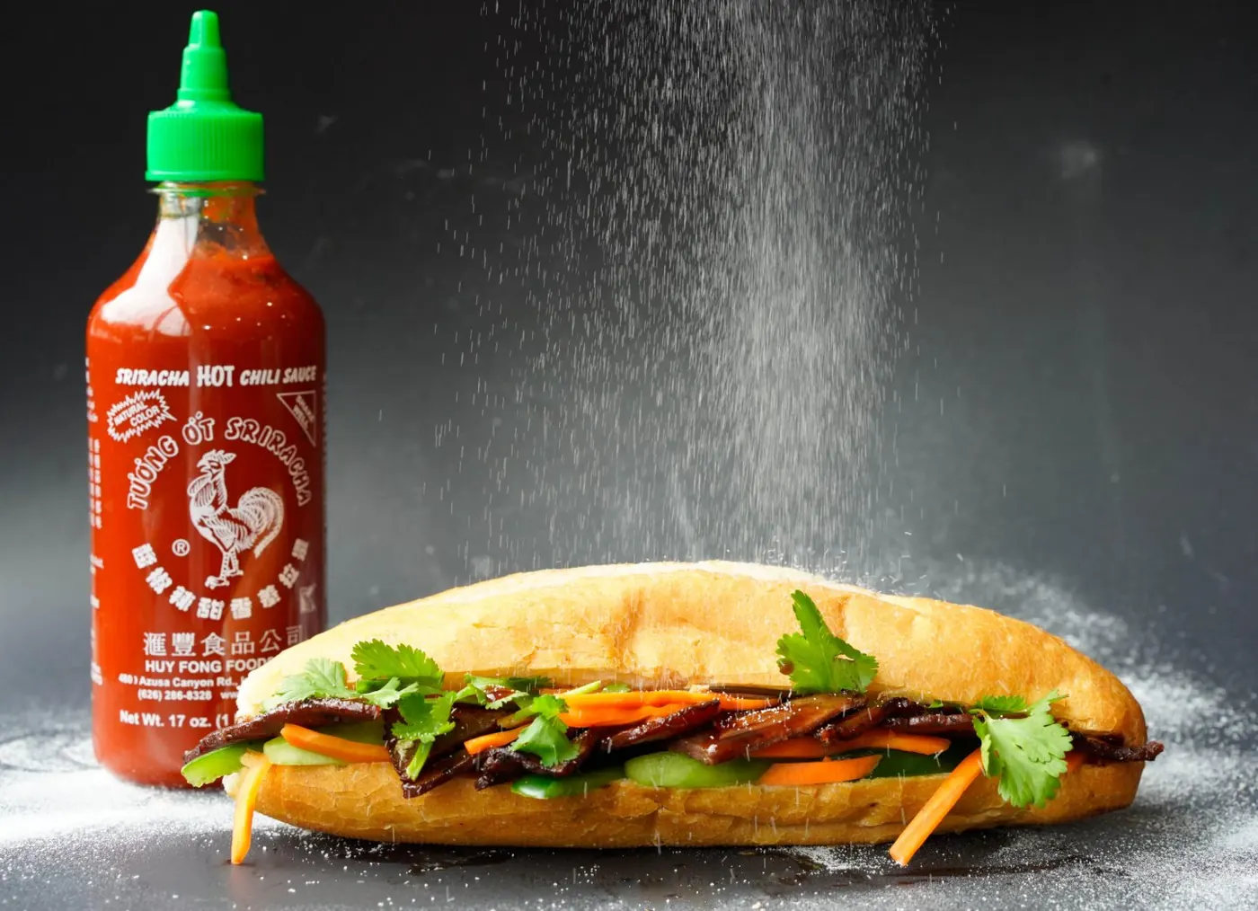 BBQ pork bánh mì with cucumber, pickled carrots and cilantro