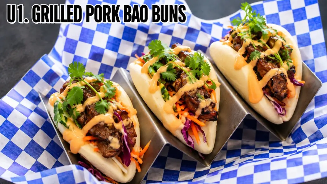 Steamed bun bao filled with grilled pork